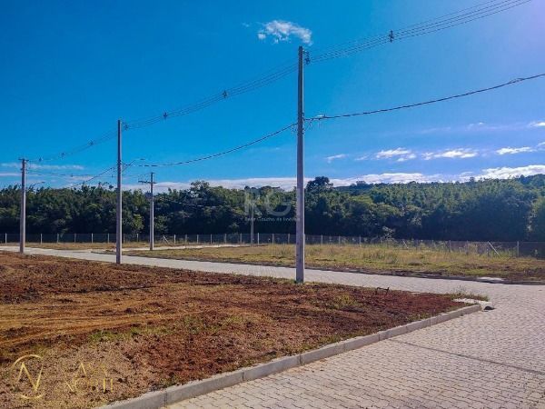 Casa de Condomínio à venda com 3 quartos, 108m², 1 suíte, 2 vagas, Estrada Jorge Pereira Nunes no bairro Campo Novo em Porto Alegre