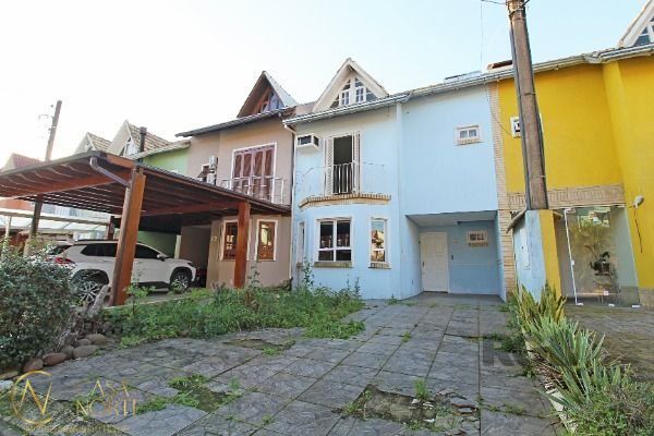 Casa de Condomínio à venda com 3 quartos, 161m², 1 suíte, 2 vagas, Rua Osorio Mendes Ouriques no bairro Guarujá em Porto Alegre