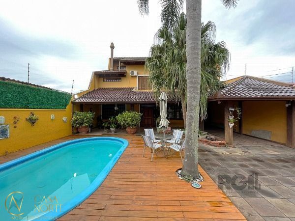 Casa à venda com 3 quartos, 300m², 1 suíte, 4 vagas, Avenida Orleaes no bairro Guarujá em Porto Alegre