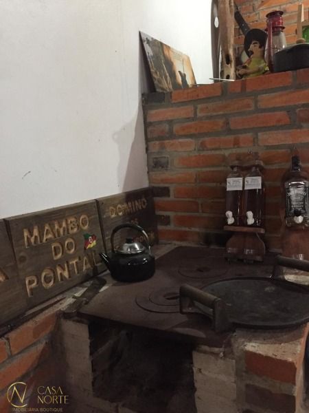 Casa à venda com 3 quartos, 320000m², 1 suíte, 10 vagas, Rua Jorge Mello Guimaraes no bairro Belém Novo em Porto Alegre