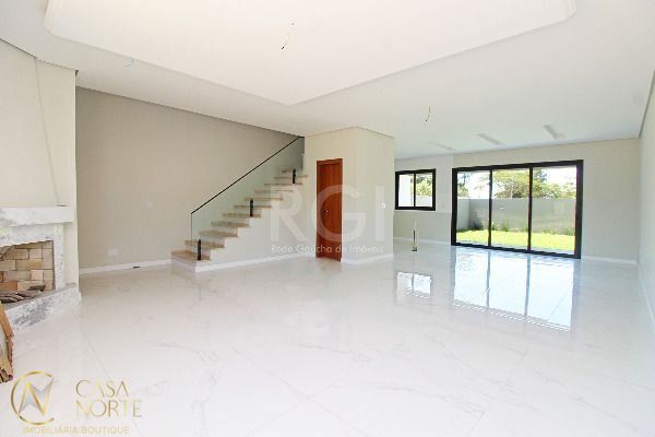 Casa à venda com 3 quartos, 152m², 2 suítes, 2 vagas, Rua João Otto Paiva no bairro Hípica em Porto Alegre