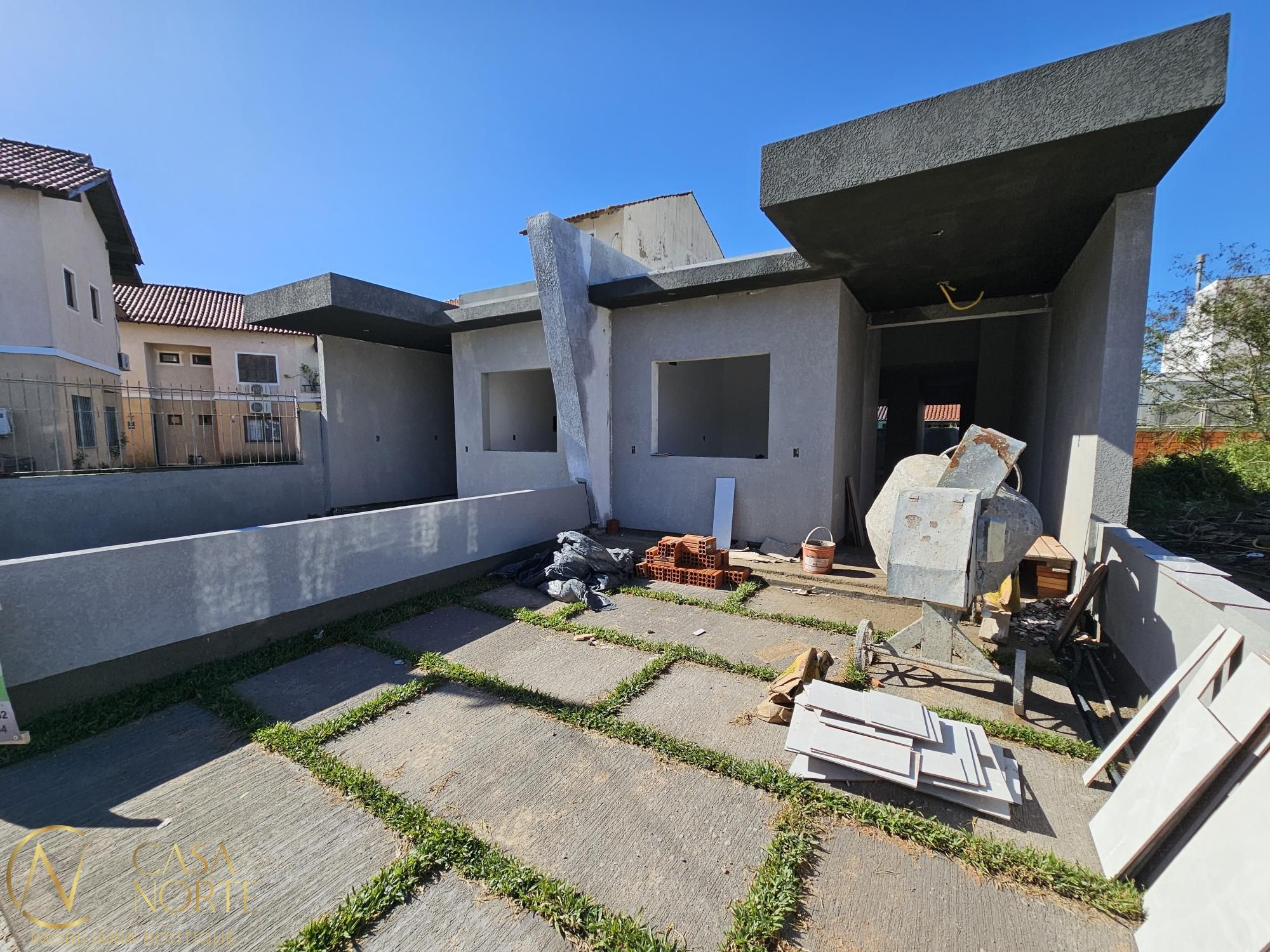 Casa à venda com 2 quartos, 80m², 1 suíte, 2 vagas, Rua Hilário Gonçalves Pinha no bairro Hípica em Porto Alegre