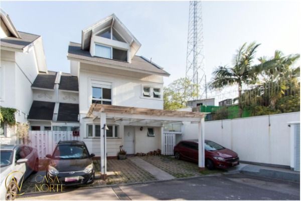 Casa de Condomínio à venda com 4 quartos, 150m², 2 suítes, 2 vagas, Rua Tocantins no bairro Lomba do Pinheiro em Porto Alegre