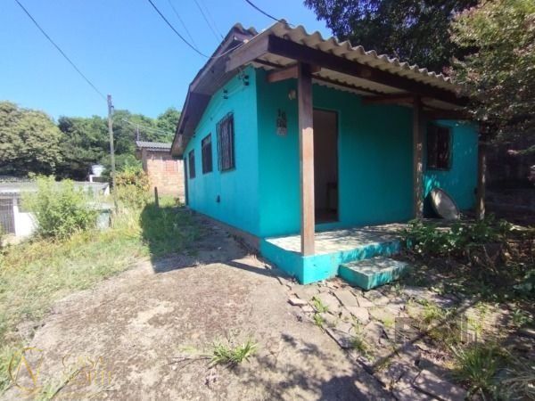 Casa à venda com 2 quartos, 60m², 1 vaga, Rua Oswaldo Olmiro Machado no bairro Ipanema em Porto Alegre