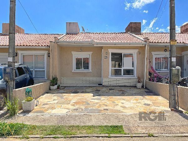 Casa de Condomínio à venda com 2 quartos, 102m², 2 vagas, Rua Embira no bairro Hípica em Porto Alegre