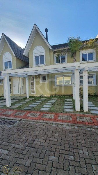 Casa de Condomínio à venda com 3 quartos, 128m², 1 suíte, 2 vagas, Rua Carlos Eduardo de Sa no bairro Aberta dos Morros em Porto Alegre