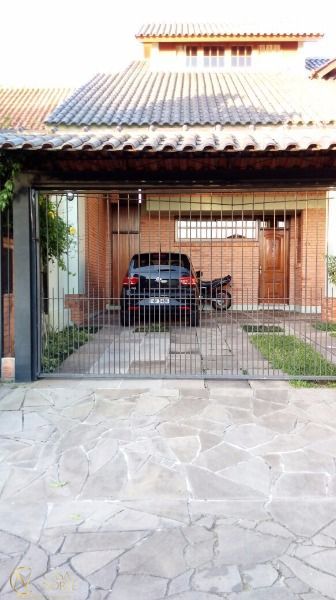 Casa à venda com 5 quartos, 254m², 1 suíte, 4 vagas, Rua Adao Pinheiro da Silva no bairro Aberta dos Morros em Porto Alegre