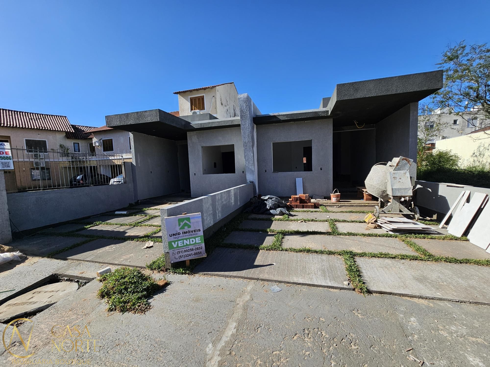 Casa à venda com 2 quartos, 80m², 1 suíte, 2 vagas, Rua Hilário Gonçalves Pinha no bairro Hípica em Porto Alegre
