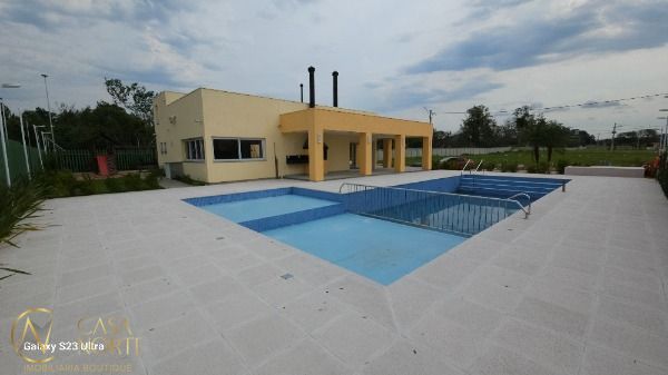 Casa de Condomínio à venda com 3 quartos, 97m², 1 suíte, 2 vagas, Avenida Juca Batista no bairro Hípica em Porto Alegre