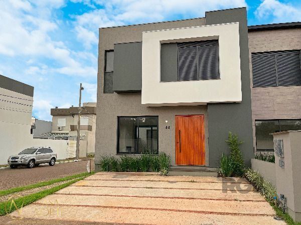 Casa de Condomínio à venda com 3 quartos, 157m², 1 suíte, 2 vagas, Rua Jean Vardaramatos no bairro Hípica em Porto Alegre
