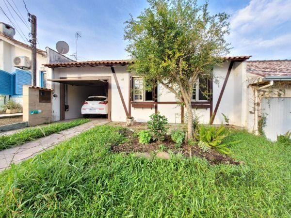 Casa de Condomínio à venda com 3 quartos, 180m², 1 suíte, 1 vaga, Avenida Edgar Pires de Castro no bairro Hípica em Porto Alegre