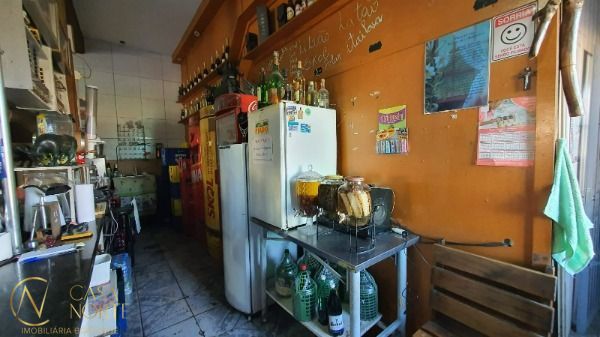 Prédio Comercial à venda com 4 quartos, 353m², 3 suítes, 2 vagas, Rua Elvira Dendena no bairro Hípica em Porto Alegre