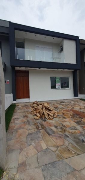 Casa à venda com 3 quartos, 162m², 2 suítes, 2 vagas, Rua João Otto Paiva no bairro Hípica em Porto Alegre