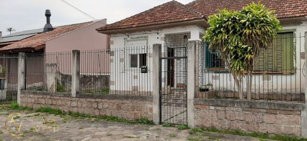 Casa à venda com 3 quartos, 135m², 1 suíte, 5 vagas, Rua Mampituba no bairro Ipanema em Porto Alegre