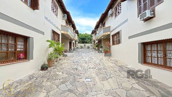 Casa de Condomínio à venda com 3 quartos, 128m², 1 suíte, 1 vaga, Rua dos Caiaguais no bairro Espírito Santo em Porto Alegre