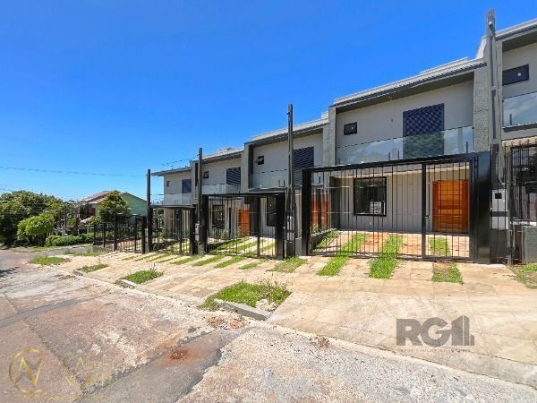 Casa de Condomínio à venda com 3 quartos, 96m², 1 suíte, 2 vagas, Rua Liberal no bairro Tristeza em Porto Alegre