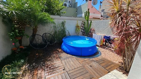 Casa à venda com 3 quartos, 120m², 1 suíte, 2 vagas, Rua Fernando Jorge Schneider no bairro Hípica em Porto Alegre