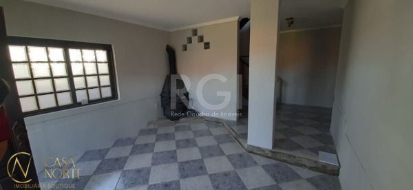 Sobrado à venda com 3 quartos, 246m², 1 suíte, 2 vagas, Rua Angelo Passuelo no bairro Vila Nova em Porto Alegre