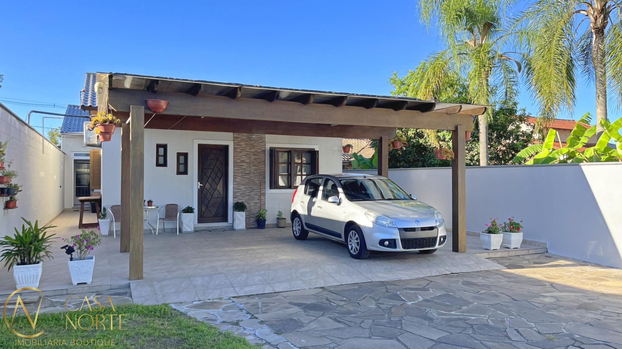 Casa à venda com 3 quartos, 154m², 2 vagas, Rua Stringhini no bairro Hípica em Porto Alegre