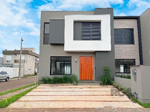 Casa de Condomínio à venda com 3 quartos, 157m², 1 suíte, 2 vagas, Rua Jean Vardaramatos no bairro Hípica em Porto Alegre