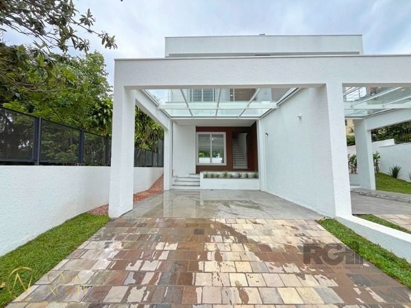 Casa à venda com 3 quartos, 155m², 1 suíte, 2 vagas, Rua Padre João Batista Reus no bairro Vila Conceição em Porto Alegre