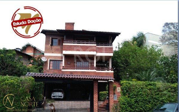 Casa à venda com 3 quartos, 320m², 1 suíte, 2 vagas, Rua Professor Leonardo Tochtrop no bairro Ipanema em Porto Alegre