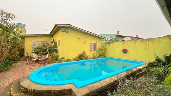 Casa à venda com 3 quartos, 155m², 2 vagas, Rua Otelo Rosa no bairro Ipanema em Porto Alegre