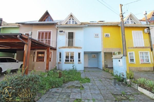 Casa de Condomínio à venda com 3 quartos, 161m², 1 suíte, 2 vagas, Rua Osorio Mendes Ouriques no bairro Guarujá em Porto Alegre