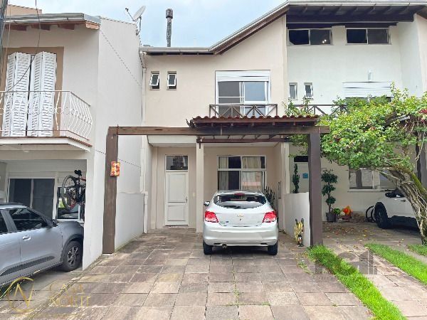 Casa de Condomínio à venda com 3 quartos, 159m², 1 suíte, 2 vagas, Estrada João Salomoni no bairro Vila Nova em Porto Alegre
