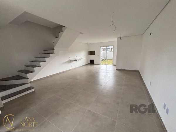 Casa de Condomínio à venda , 99m², 2 suítes, 2 vagas, Estrada Jorge Pereira Nunes no bairro Campo Novo em Porto Alegre