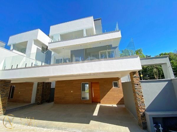 Casa de Condomínio à venda com 3 quartos, 364m², 3 suítes, 2 vagas, Avenida Coronel Marcos no bairro Pedra Redonda em Porto Alegre