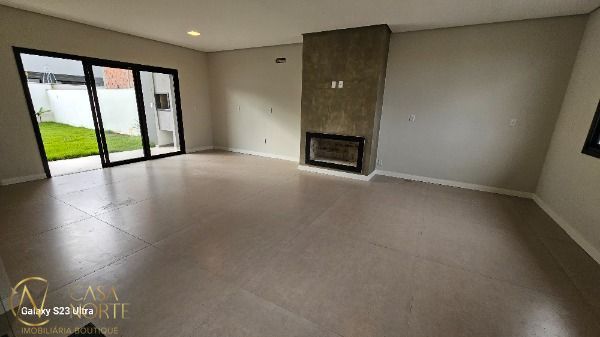 Casa à venda com 3 quartos, 125m², 1 suíte, 2 vagas, Rua Alessandra Sanhudo Malinski no bairro Hípica em Porto Alegre