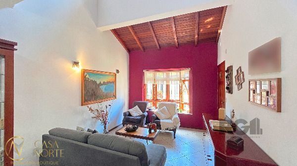 Casa à venda com 3 quartos, 140m², 1 suíte, 2 vagas, Rua Irany de Oliveira Santanna no bairro Hípica em Porto Alegre