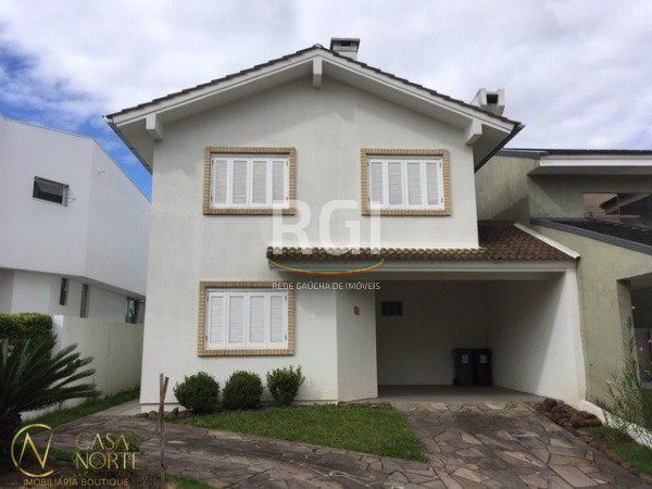 Casa de Condomínio à venda com 3 quartos, 190m², 1 suíte, 3 vagas, Avenida Edgar Pires de Castro no bairro Aberta dos Morros em Porto Alegre