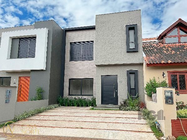 Casa de Condomínio à venda com 3 quartos, 136m², 1 suíte, 2 vagas, Rua Jean Vardaramatos no bairro Hípica em Porto Alegre