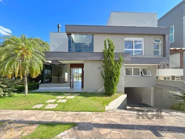Casa de Condomínio à venda com 3 quartos, 335m², 3 suítes, 4 vagas, Rua Francisco Solano Borges no bairro Hípica em Porto Alegre
