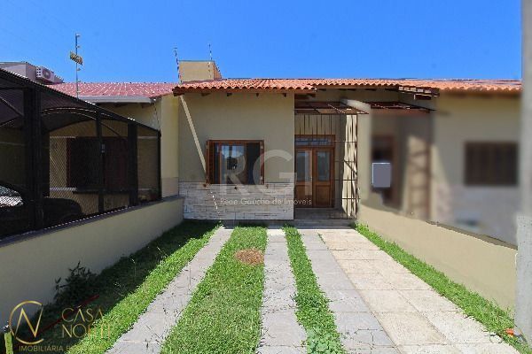 Casa à venda com 3 quartos, 103m², 1 suíte, 1 vaga, Rua Amoni no bairro Aberta dos Morros em Porto Alegre