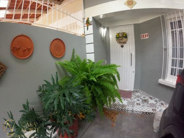 Sobrado à venda com 3 quartos, 140m², 1 suíte, 2 vagas, Rua James Bocacio no bairro Hípica em Porto Alegre