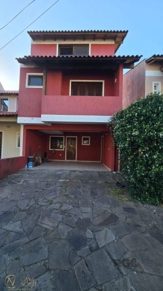 Casa à venda com 3 quartos, 168m², 1 suíte, 2 vagas, Rua Guatambu no bairro Hípica em Porto Alegre