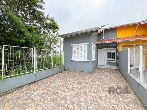 Casa à venda com 2 quartos, 70m², 2 suítes, 2 vagas, Rua Baldoino Bottini no bairro Hípica em Porto Alegre