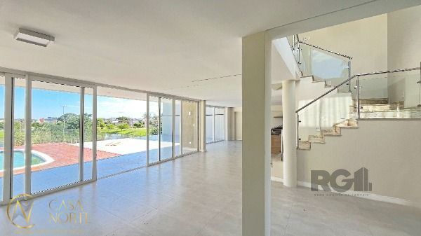 Casa de Condomínio à venda com 3 quartos, 335m², 3 suítes, 4 vagas, Rua Francisco Solano Borges no bairro Hípica em Porto Alegre