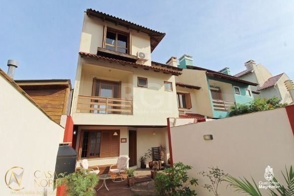 Casa à venda com 4 quartos, 178m², 2 suítes, 2 vagas, Rua Kyve T. Knijnik no bairro Espírito Santo em Porto Alegre