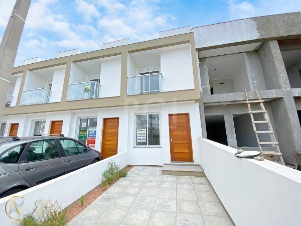 Casa à venda com 2 quartos, 90m², 2 suítes, 1 vaga, Rua Eroni Soares Machado no bairro Hípica em Porto Alegre