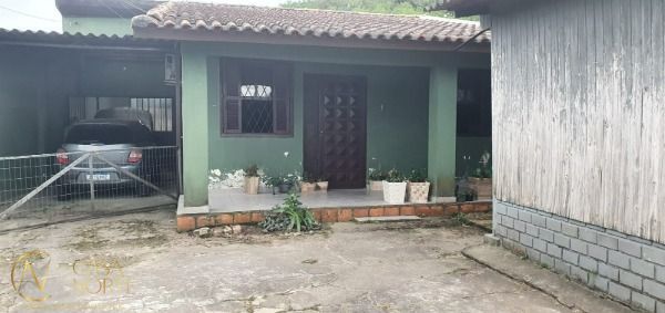 Casa à venda com 2 quartos, 110m², 3 vagas, Avenida do Lami no bairro Belém Novo em Porto Alegre