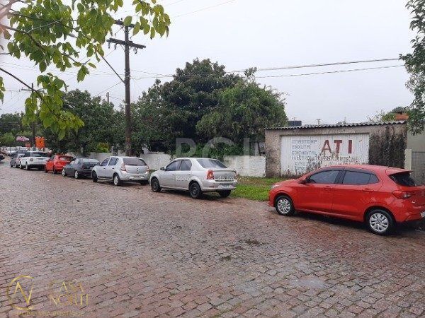 Terreno à venda  com 410m², Avenida Eduardo Prado no bairro Cavalhada em Porto Alegre