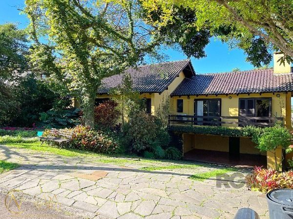 Casa de Condomínio à venda com 4 quartos, 400m², 2 suítes, 4 vagas, Avenida Firmino Octavio Bimbi no bairro Cavalhada em Porto Alegre