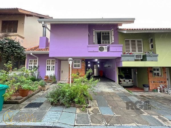 Casa de Condomínio à venda com 3 quartos, 201m², 1 suíte, 2 vagas, Rua Padre João Batista Reus no bairro Tristeza em Porto Alegre