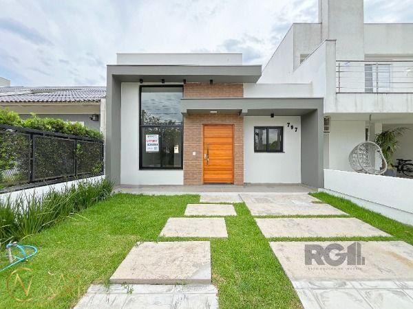 Casa à venda com 3 quartos, 93m², 1 suíte, 1 vaga, Rua Fernando Jorge Schneider no bairro Hípica em Porto Alegre