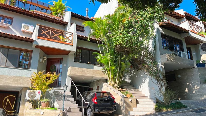 Casa de Condomínio à venda com 3 quartos, 174m², 1 suíte, 3 vagas, Rua Landel de Moura no bairro Tristeza em Porto Alegre