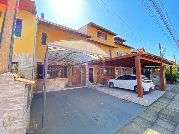 Casa de Condomínio à venda com 3 quartos, 191m², 2 suítes, 2 vagas, Avenida Edgar Pires de Castro no bairro Hípica em Porto Alegre